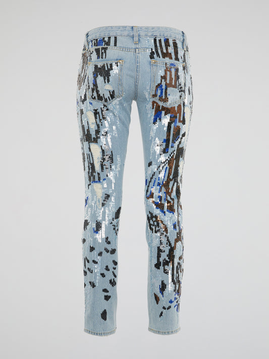 Let your inner rockstar shine with these Sequin Detailed Distressed jeans from Roberto Cavalli. The intricate sequin embellishments add a touch of glamour to the edgy distressed denim, perfect for making a statement wherever you go. Slip into these jeans and unleash your bold, fearless style that is bound to turn heads and spark conversations.