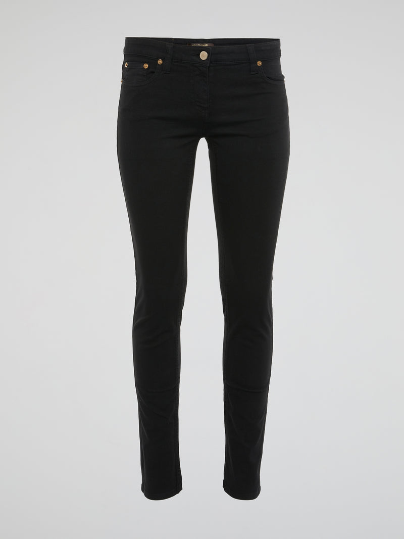 Elevate your style with these sleek and edgy Black Skinny Jeans by Roberto Cavalli - crafted for the fashion-forward individual who isn't afraid to make a bold statement. The figure-hugging fit and luxe detailing will have heads turning wherever you go, effortlessly taking you from day to night in style. Embrace your inner trendsetter with these must-have jeans that exude confidence and sophistication.
