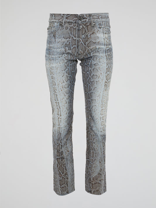 Unleash your wild side with the Roberto Cavalli Snake Print Denim Jeans, a bold and daring addition to your wardrobe that will turn heads wherever you go. Crafted from high-quality denim, these jeans feature a sleek snake print design that adds a touch of edgy sophistication to any outfit. Embrace your inner fashionista and elevate your style with these statement-making jeans that are sure to make you stand out from the crowd.