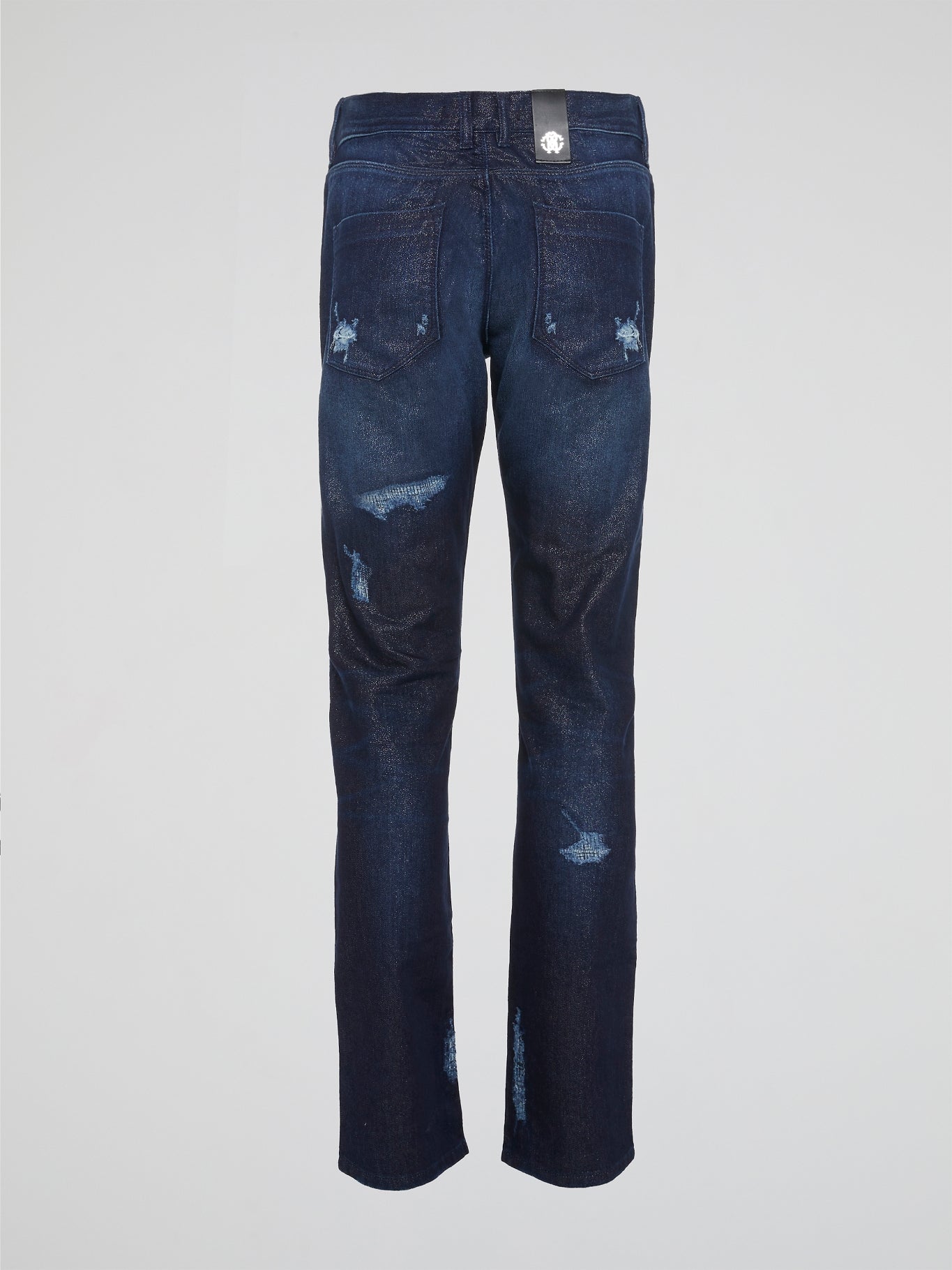 Experience the ultimate in denim luxury with our Navy Distressed Slim Fit Jeans by Roberto Cavalli. Crafted with precision and attention to detail, these jeans are a work of art, combining edgy distressing with a sleek slim fit silhouette. Make a bold fashion statement with these versatile jeans that will take you from day to night in style.