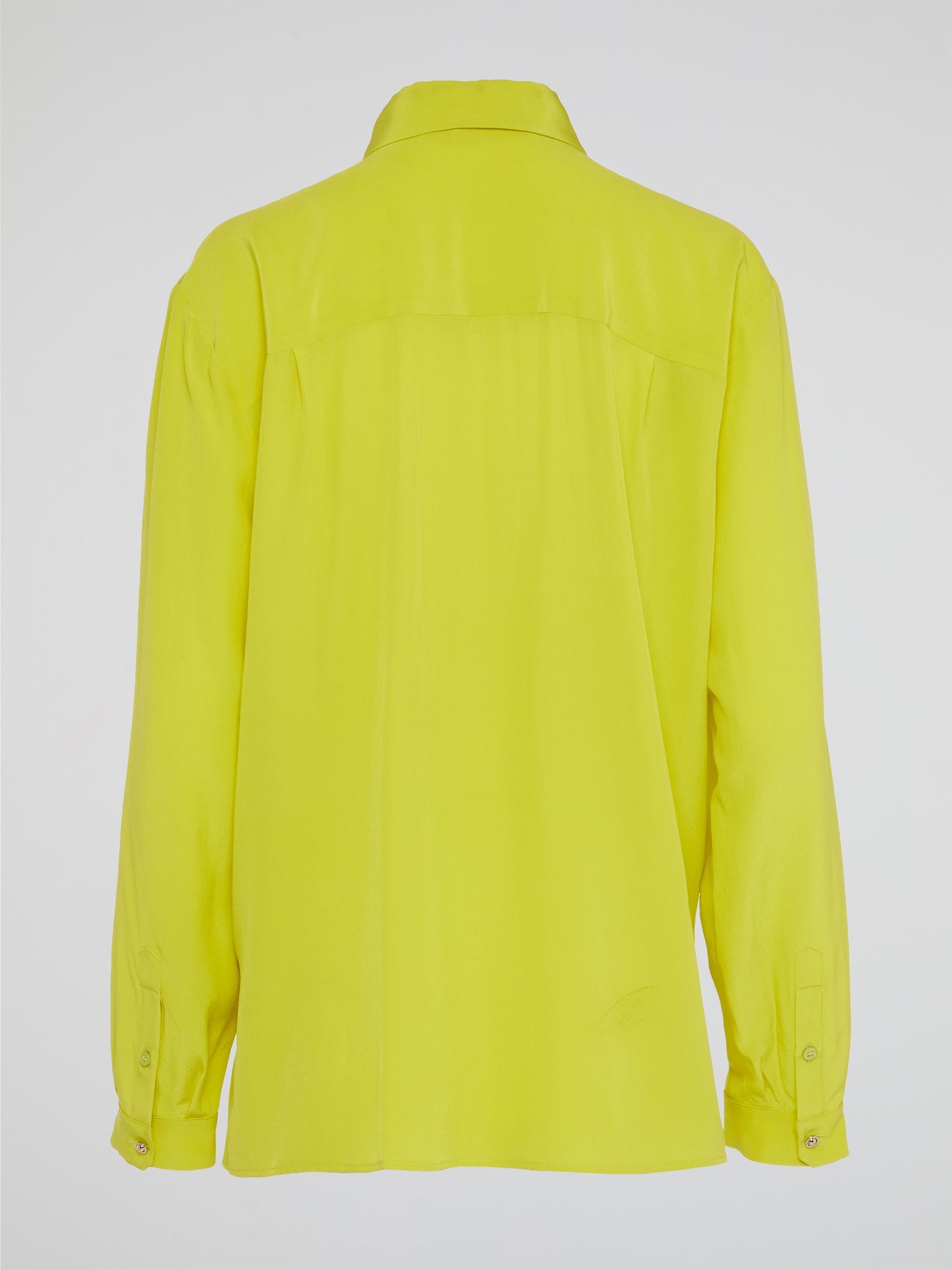 Embrace your inner rockstar with the Neon Lace Up Blouse by Roberto Cavalli, the perfect combination of edgy and sophisticated. With its bold neon color and sexy lace-up detailing, this top is sure to turn heads wherever you go. Pair it with your favorite leather pants for a look that screams fierce and fabulous.