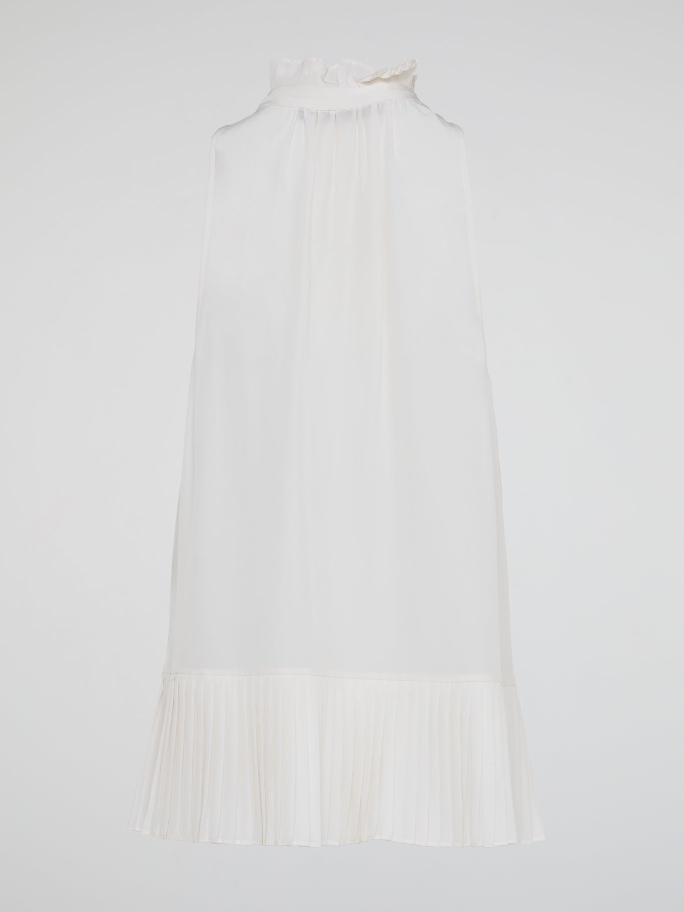 Elevate your summer wardrobe with the White Sleeveless Frill Top by Roberto Cavalli, a chic and feminine piece that exudes effortless elegance. Crafted with impeccable tailoring and delicate frill details, this top is perfect for any occasion, from casual brunches to evening soir茅es. Embrace your inner fashionista and turn heads wherever you go with this must-have addition to your closet.