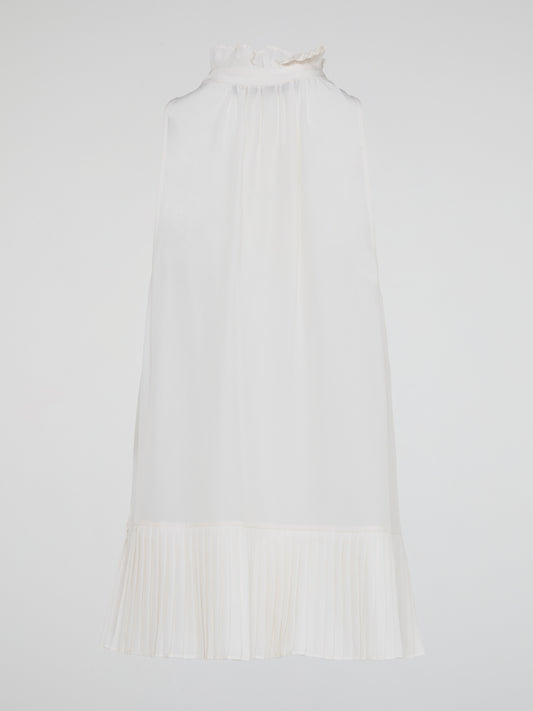 Elevate your summer wardrobe with the White Sleeveless Frill Top by Roberto Cavalli, a chic and feminine piece that exudes effortless elegance. Crafted with impeccable tailoring and delicate frill details, this top is perfect for any occasion, from casual brunches to evening soir茅es. Embrace your inner fashionista and turn heads wherever you go with this must-have addition to your closet.