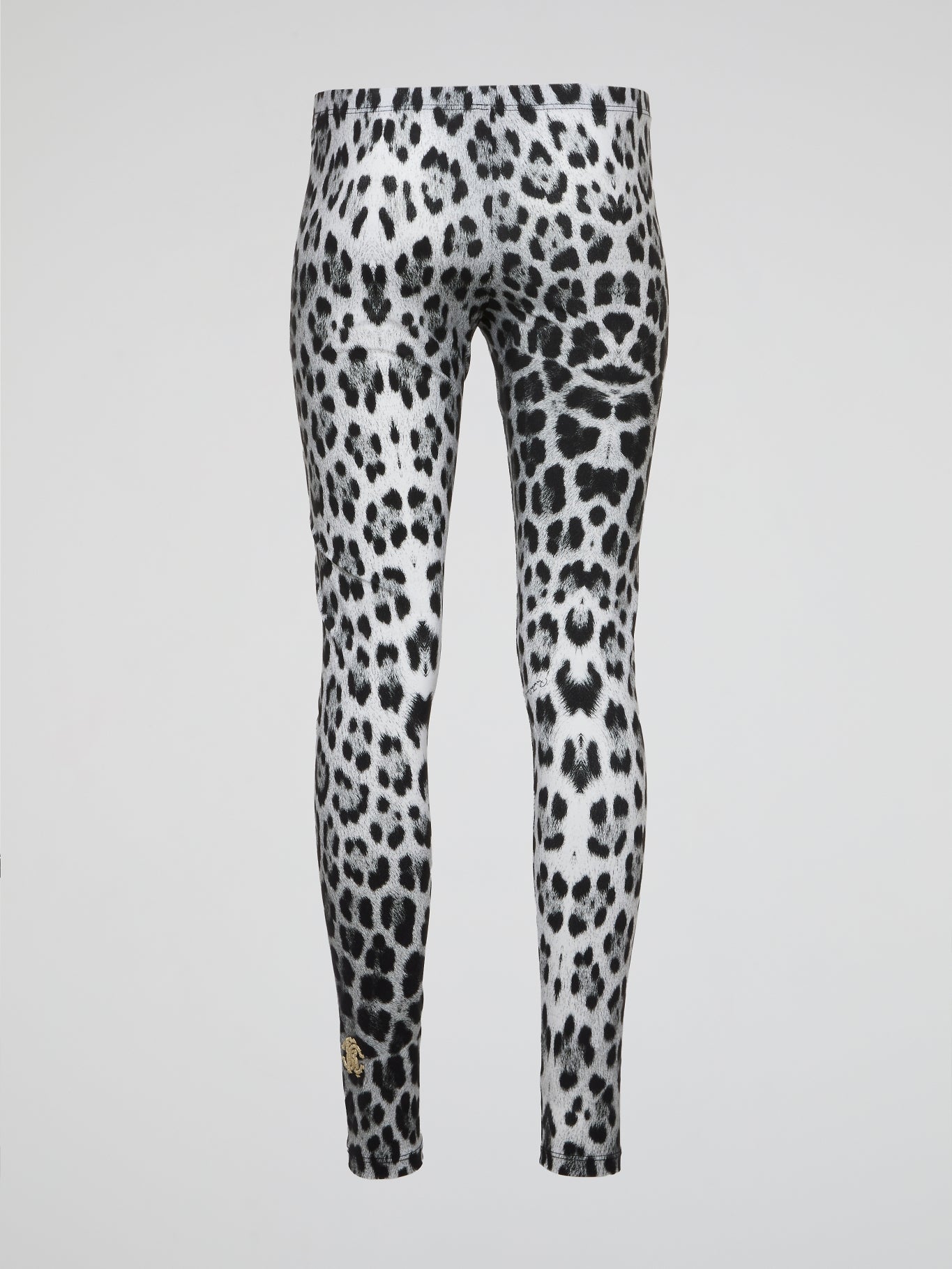 Unleash your wild side with these fierce Roberto Cavalli leopard print leggings that will add a touch of luxury to your everyday wardrobe. Made with high-quality materials and expert craftsmanship, these statement leggings are a must-have for trendsetters and fashion enthusiasts alike. Whether you're running errands or hitting the gym, stand out from the crowd and show off your unique style with these eye-catching leggings.