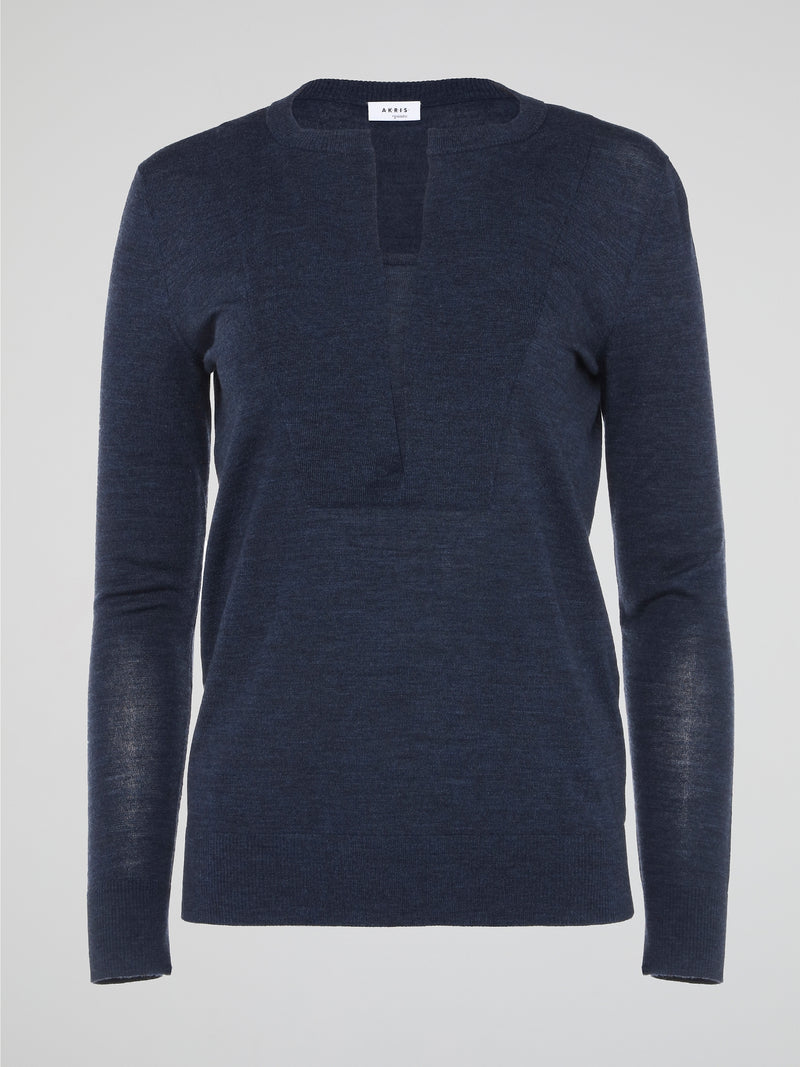 Wrap yourself in effortless style with the Navy Long Sleeve Top by Akris Punto. Crafted with the utmost attention to detail, this versatile piece exudes sophistication whilst offering unrivaled comfort. Elevate your wardrobe and make a statement with this chic and timeless addition that seamlessly takes you from day to night.