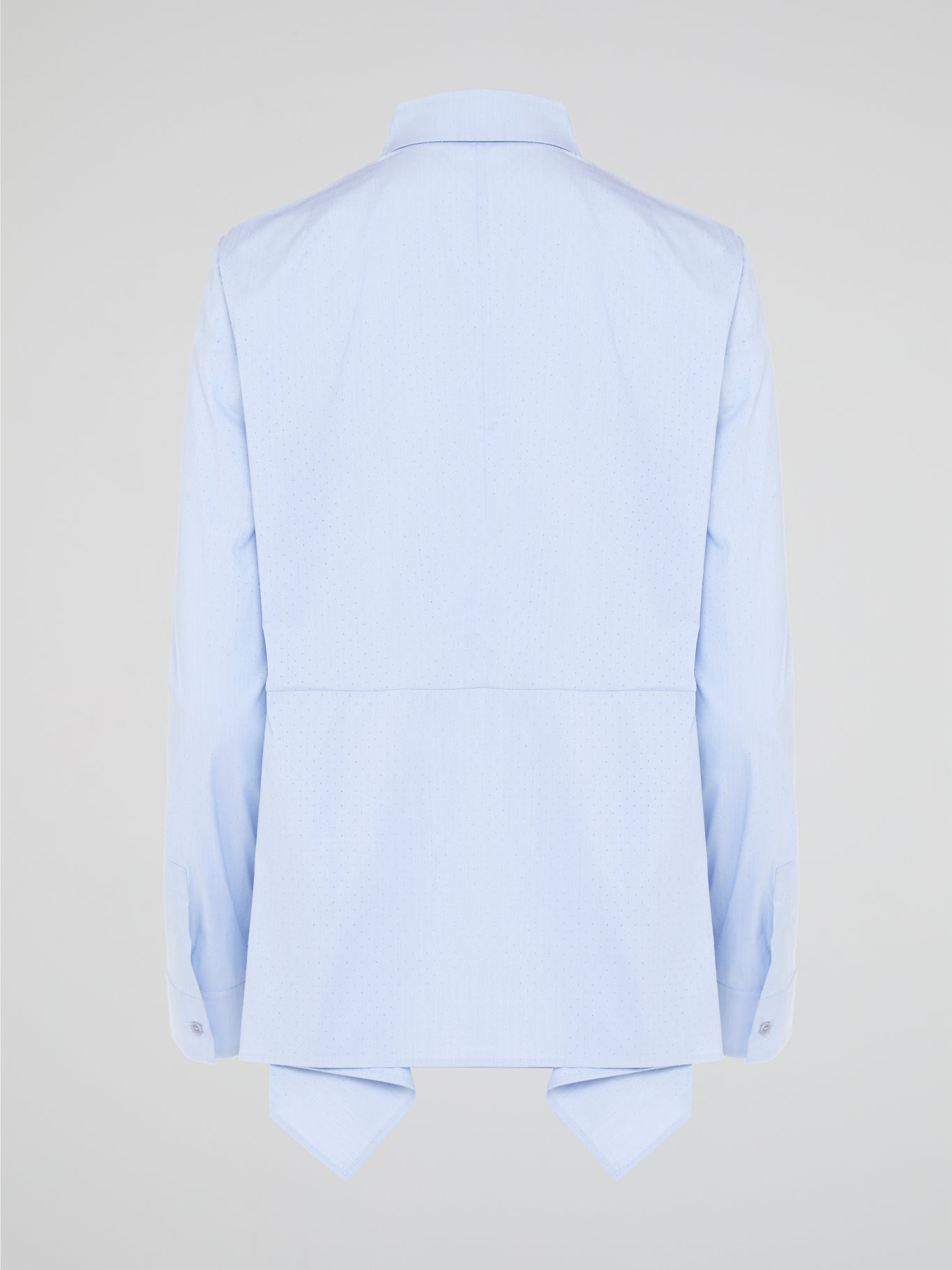 Introducing the Powder Blue High-Low Shirt by Akris Punto, where elegance meets contemporary style. Delicate powder blue hue cascades down the front, enveloping you in a calming wave of tranquility. With its unique high-low hemline and luxurious fabric, this shirt effortlessly elevates any outfit, making it a must-have piece for the fashion-forward trendsetters.