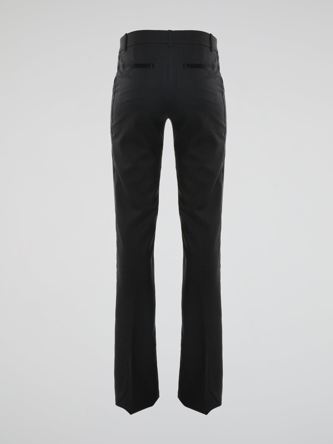 Step out in style and make heads turn with these stunning Black Flared Pants by Roberto Cavalli. Crafted with impeccable precision, these pants exude timeless elegance and are perfect for any occasion. With their flattering fit and luxurious fabric, they effortlessly combine sophistication and comfort, elevating your fashion game to new heights.