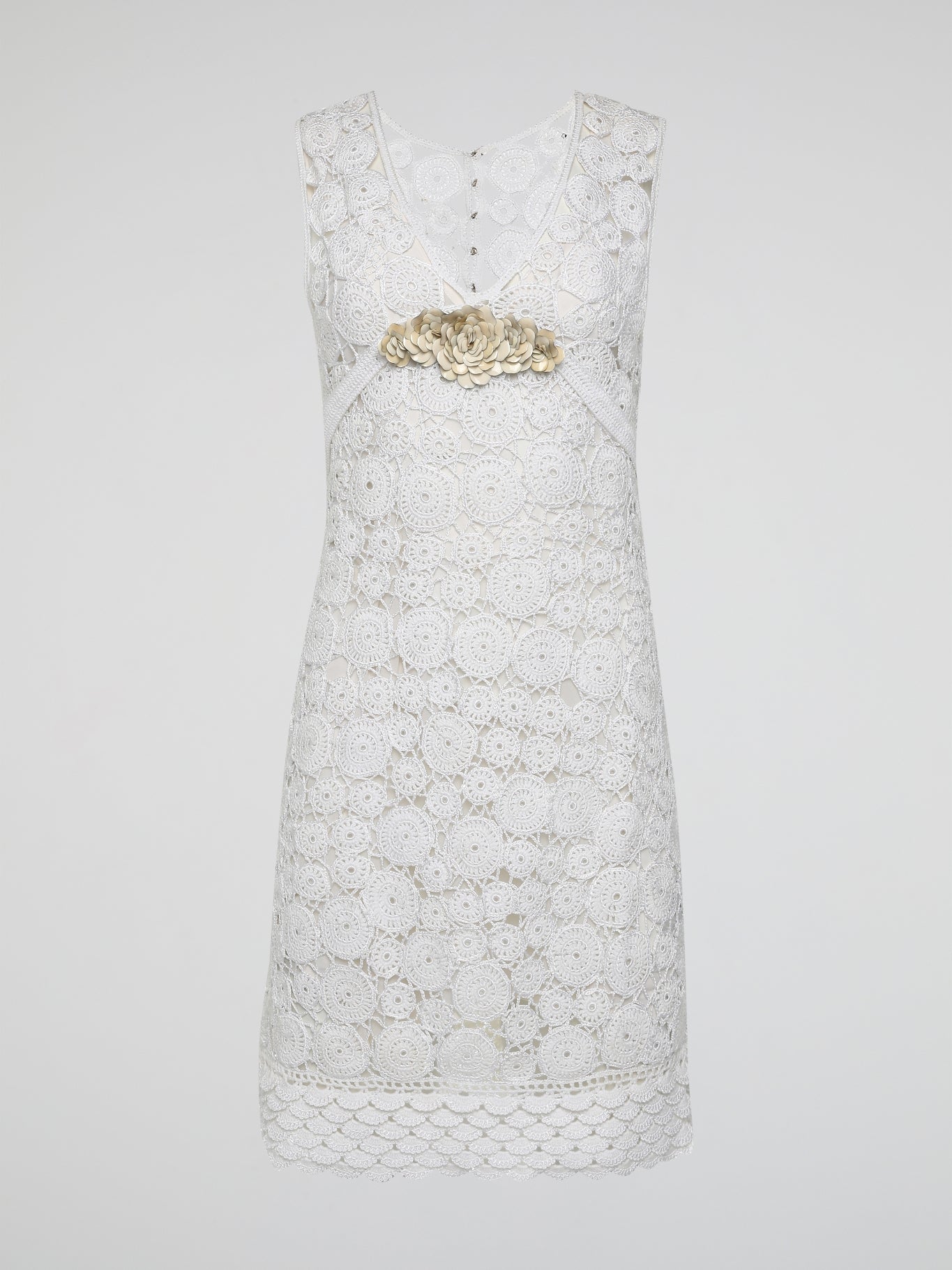 Step into the world of exquisite elegance with this captivating White Crochet Dress by Roberto Cavalli. Crafted with meticulous attention to detail, this dress channels the essence of femininity, showcasing delicate crochet patterns that gracefully embrace your silhouette. Whether you're attending a garden soiree or a beachfront dinner, this dress effortlessly combines timeless charm with modern flair, making you the epitome of effortless beauty.