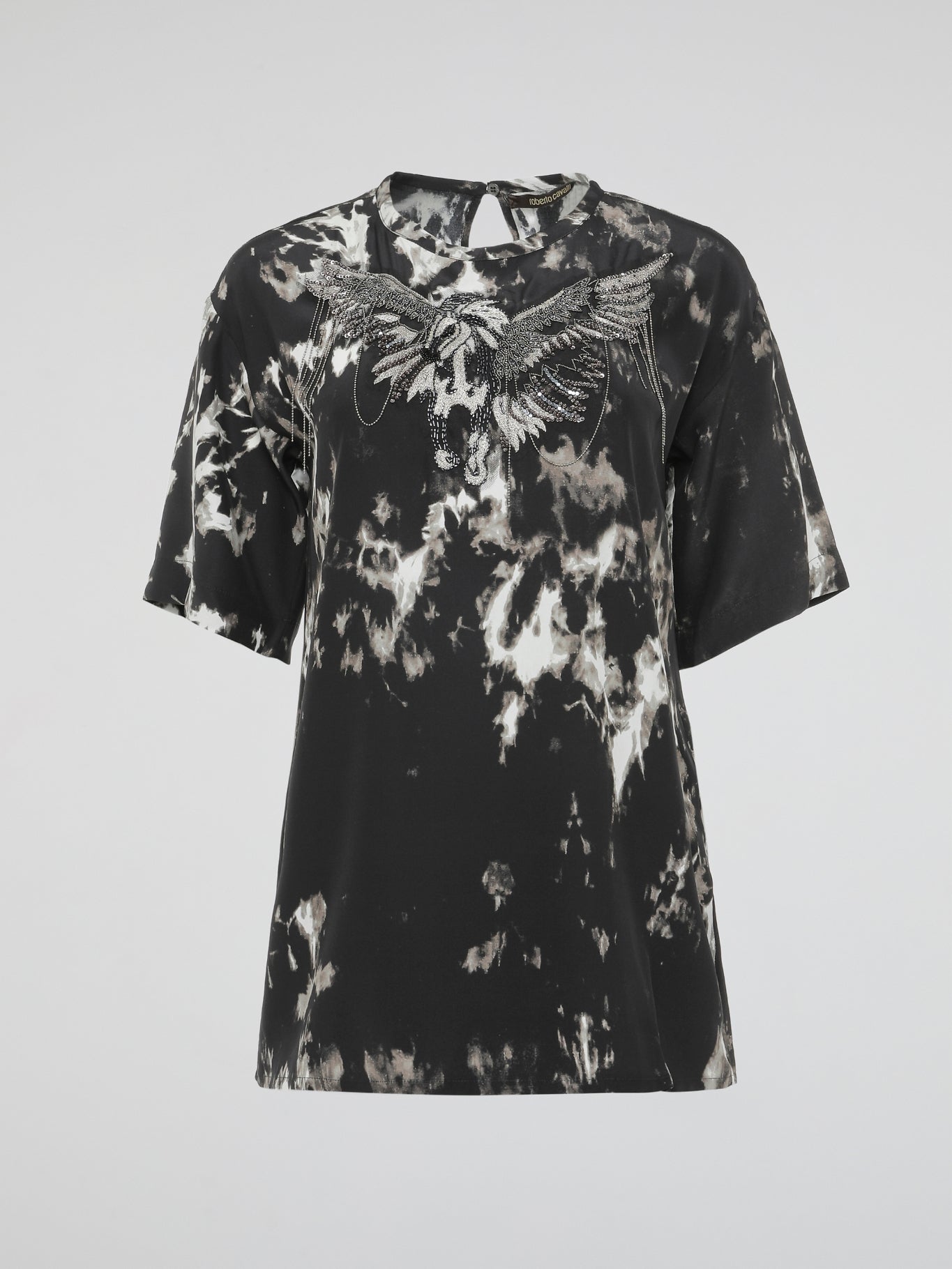 Wrap yourself in luxury with the Roberto Cavalli Black Embroidered Oversized T-Shirt. Crafted with impeccable attention to detail, this statement piece combines sophistication and comfort. The intricate embroidery adds a touch of glamour to the oversized silhouette, making it the perfect choice for fashion-forward individuals who refuse to compromise on style.