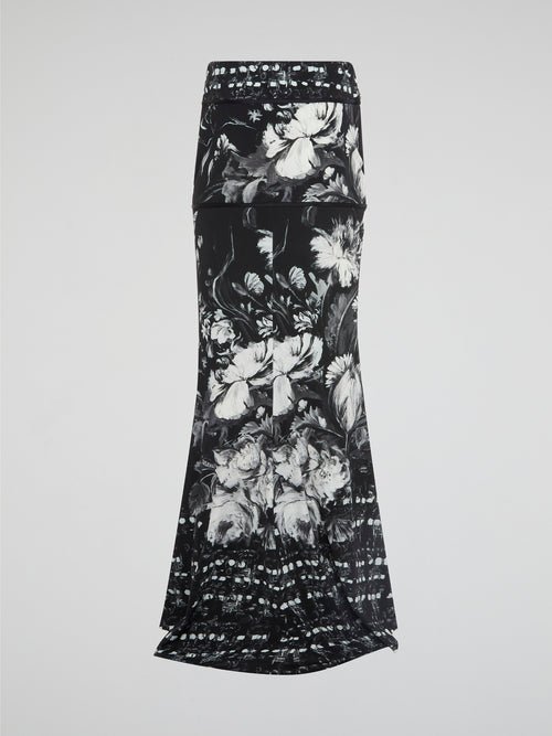 Elevate your summer style with this stunning Floral Print Maxi Skirt from Roberto Cavalli. The vibrant colors and intricate floral design will have you turning heads wherever you go. Perfect for brunch with friends or a romantic date night, this skirt is a must-have for any fashion-forward individual. Let your outfit bloom with beauty in this exquisite piece from Roberto Cavalli.