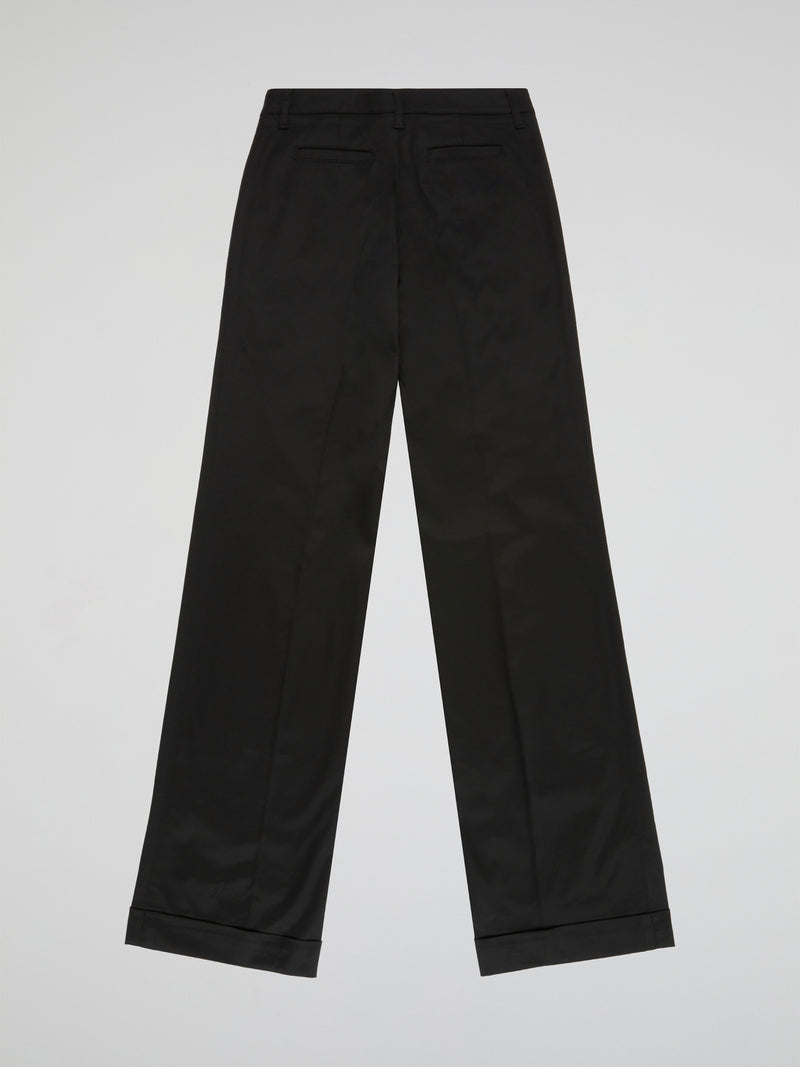 Step up your style game with these sleek and sophisticated Black Straight Leg Trousers by Blumarine. Crafted from premium quality fabric, these trousers are designed to flatter your figure and provide all-day comfort. Perfect for work or a night out, these versatile trousers will have you looking effortlessly chic and stylish.