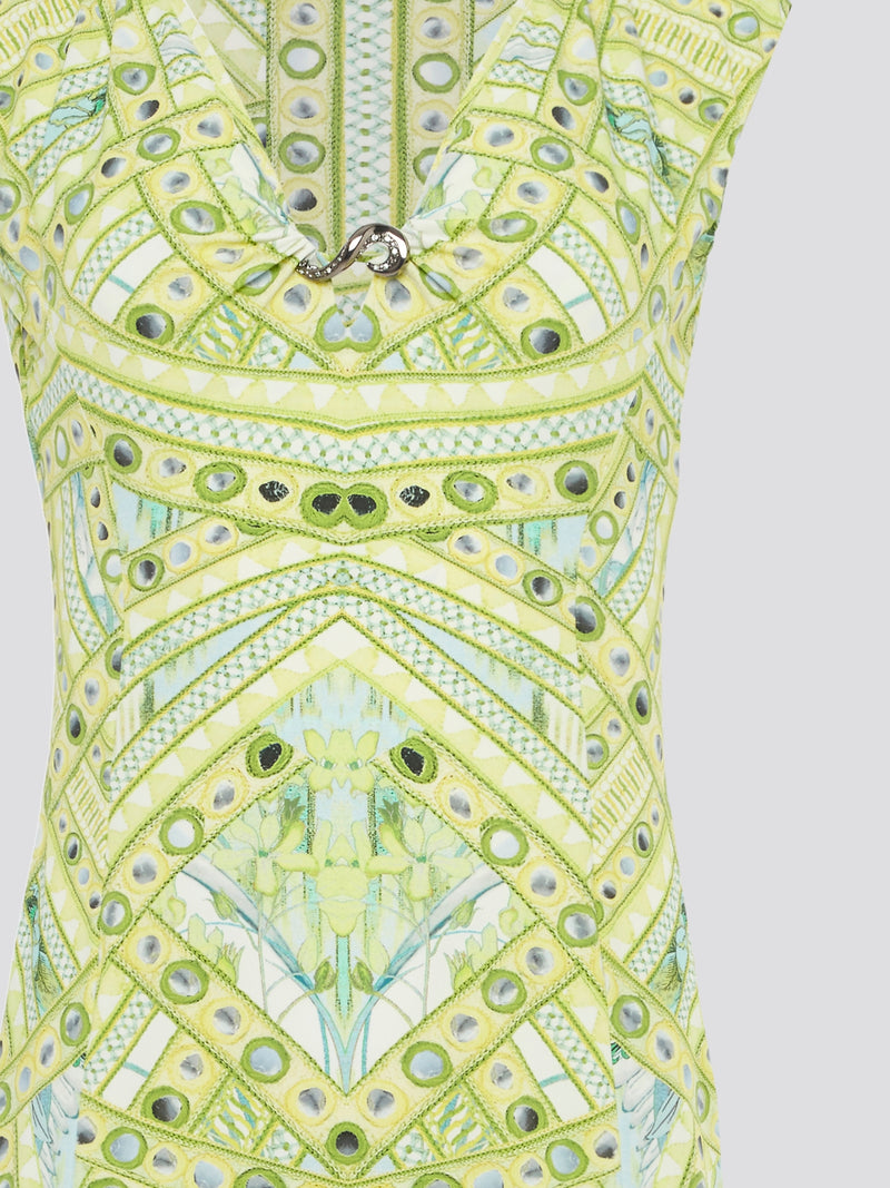 Embrace your inner goddess with this stunning Green Printed Sleeveless Dress from Roberto Cavalli. The intricate floral pattern and bold green hue will turn heads wherever you go, making you feel like a true fashion icon. Perfect for summer weddings, garden parties, or even a night out on the town, this dress is a must-have for any fashion-forward woman.