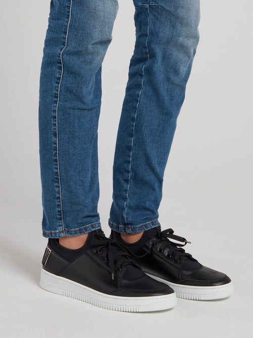 Черные низкие кожаные кроссовки