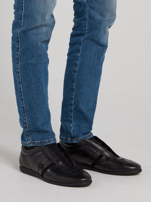 Черные низкие кроссовки из кожи с логотипом