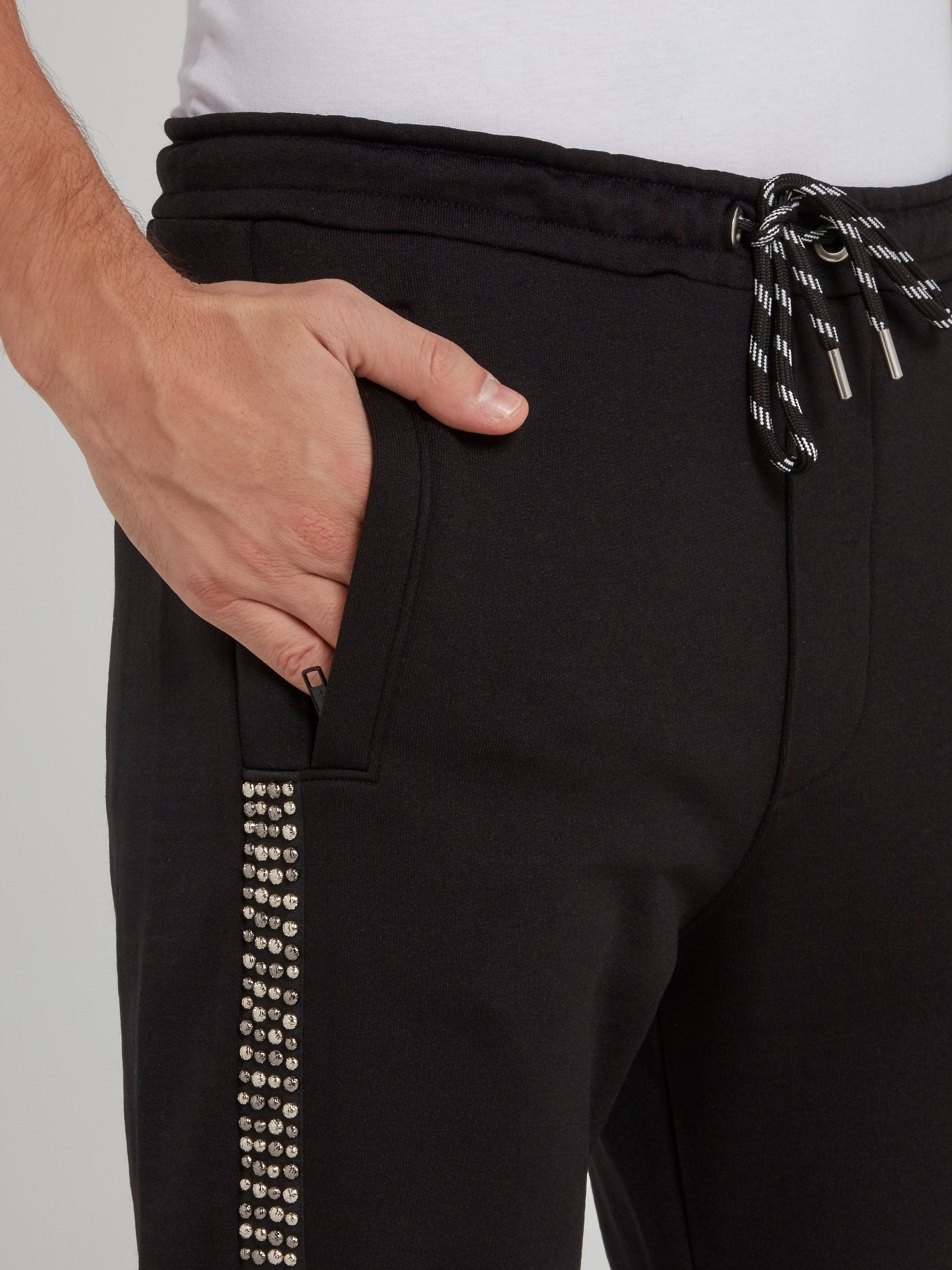 Черные спортивные брюки на резинке с лампасами из страз