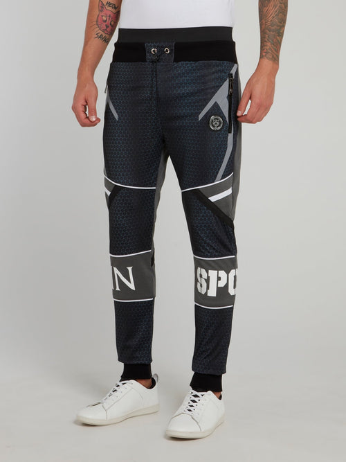 Темно-синие спортивные брюки с геометрическим принтом Klaas