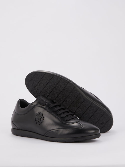 Черные низкие кожаные кроссовки с монограммой